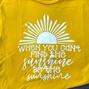 Women’s small tshirt; yellow; never worn